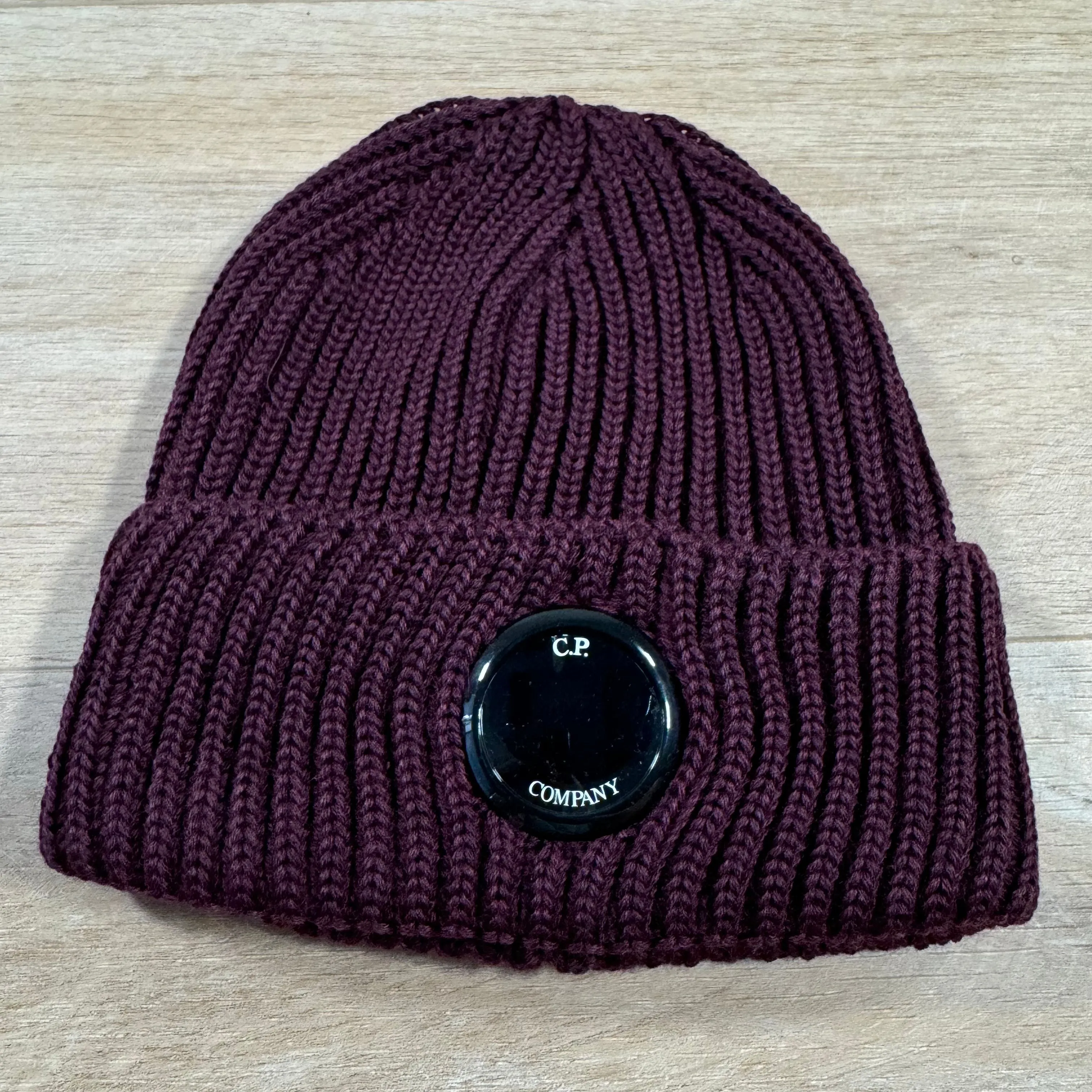 C.P. Company Extra Fine Merino Wool Lens Beanie in Potent Purple